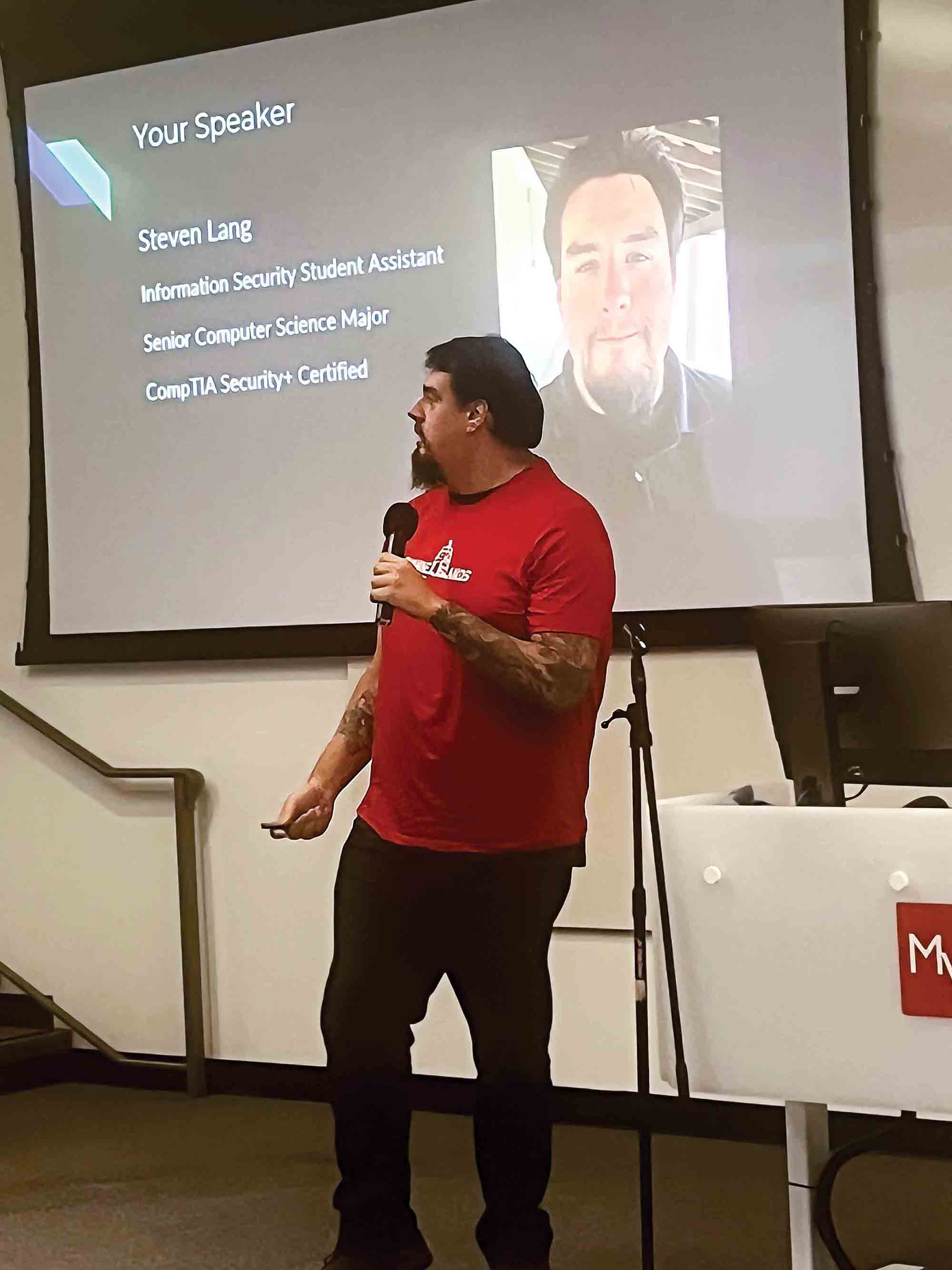 Computer Science student Steven Lang speaks at the CSUCI Cybersecurity Awareness Month event in October.