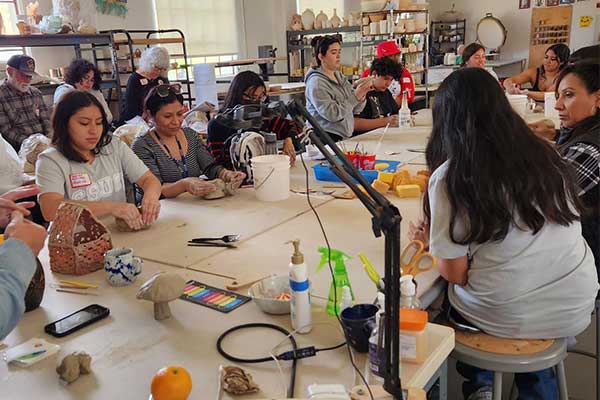 Students working together in a table